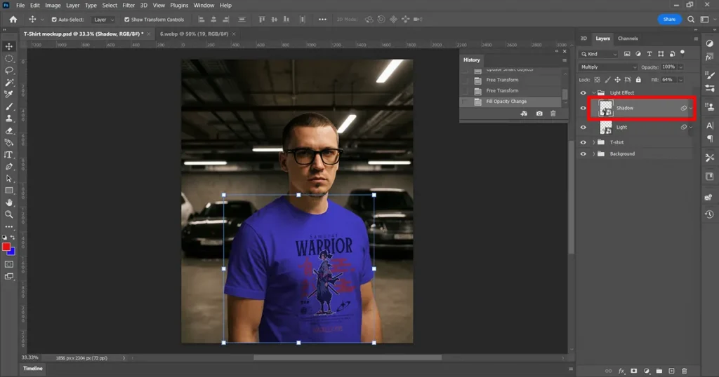 click on the shadow layer in the PSD t-shirt mockup