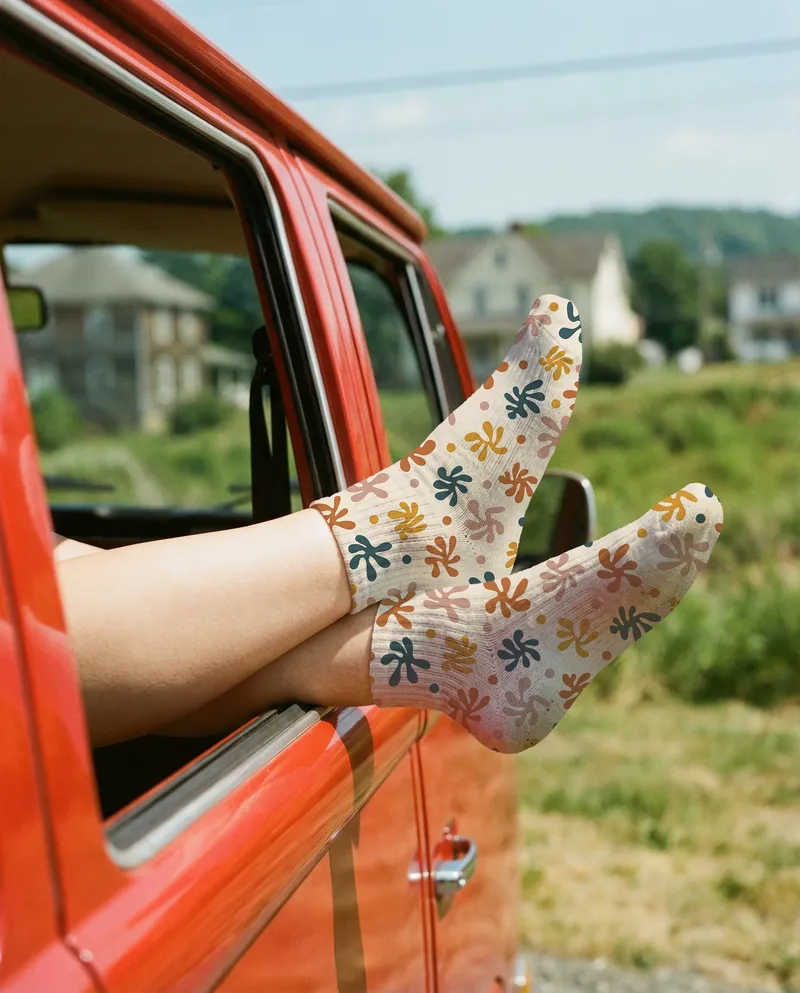 Lifestyle Ankle Socks Mockup in Car Window